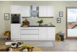 Hoogglans en greeploze witte keuken van Meister inclusief apparatuur